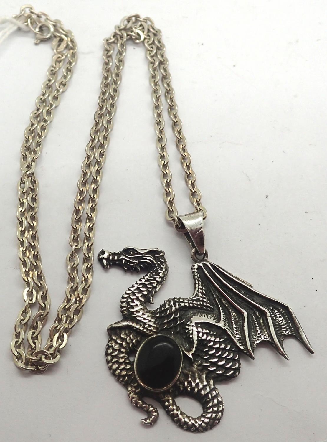 Silver dragon pendant with black onyx on a silver chain. P&P Group 1 (£14+VAT for the first lot - Image 2 of 2
