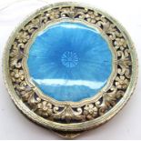 White metal and blue enamel powder compact with pierced and engraved decoration, D: 75 mm. P&P Group