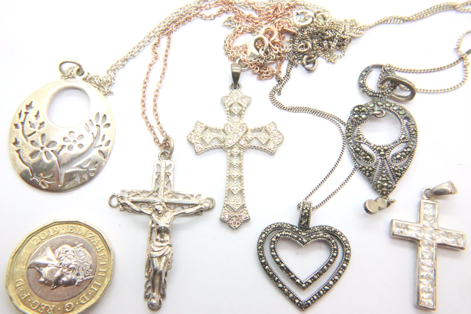 Three 925 silver pendant necklaces, crucifix pendant necklace and two stone-set silver cross