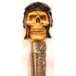 Skull handled walking stick, L: 86 cm. P&P Group 3 (£25+VAT for the first lot and £5+VAT for