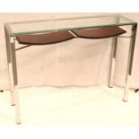A contemporary chrome console with rectangular plate glass top and two shelves below, 100 x 30 x