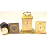 Looping, an eight day eighteen jewel brass cased alarm clock, a further Looping travel clock, a