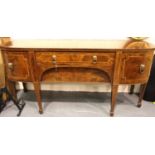 Regency mahogany bow fronted buffet, with two long drawers flanked by two cupboard doors,
