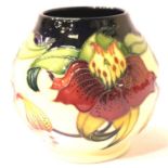 Moorcroft vase in the Anna Lily pattern, H: 10 cm. P&P Group 1 (£14+VAT for the first lot and £1+VAT