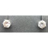 Pair of 9ct white gold stone set earrings, boxed. P&P Group 1 (£14+VAT for the first lot and £1+