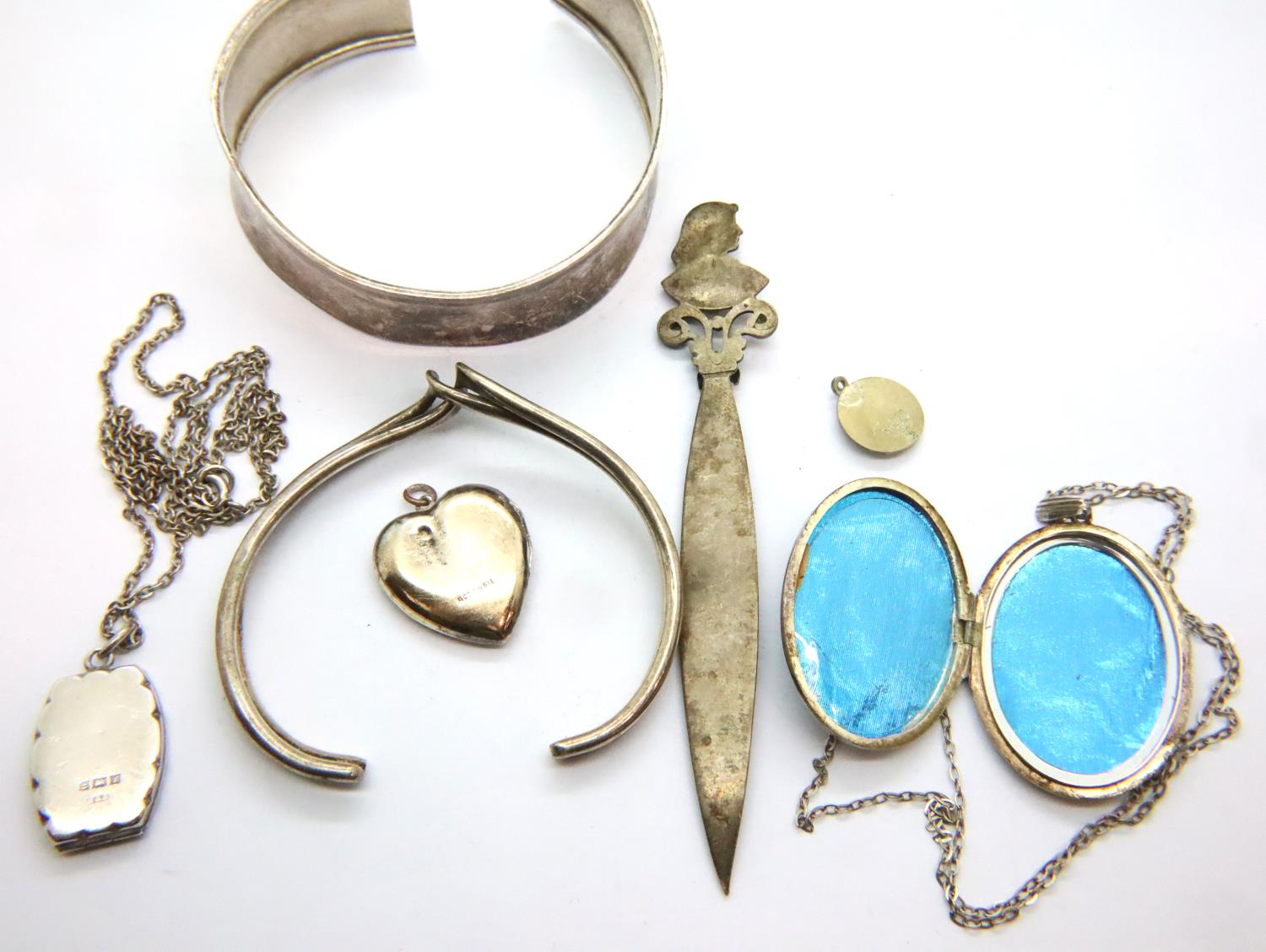 Three hallmarked silver locket pendants, two bangles and a silver plate book/page marker. P&P - Image 2 of 2