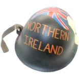 British issue helmet with post war memorial painting, leather lined with canvas chinstrap. P&P Group