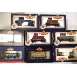Eight Bachmann boxed wagons; hoppers, conflat and container, tanker etc. P&P Group 2 (£18+VAT for