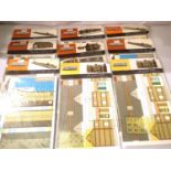 Nine Superquick Card OO scale building kits; four houses x2, loco shed, country station, island