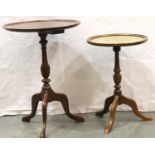 Two 20th Century mahogany tripod tables, one with leather top. Not available for in-house P&P,