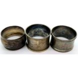 Three hallmarked silver napkin rings, combined 61g. P&P Group 1 (£14+VAT for the first lot and £1+