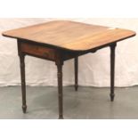 A 19th Century mahogany Pembroke table, raised on turned supports and with single drawer, for