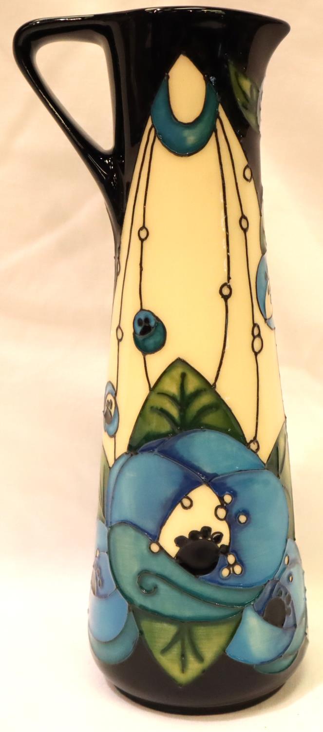 Moorcroft jug in the blue Rennie Rose pattern, H: 19 cm. P&P Group 2 (£18+VAT for the first lot