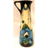 Moorcroft jug in the blue Rennie Rose pattern, H: 19 cm. P&P Group 2 (£18+VAT for the first lot