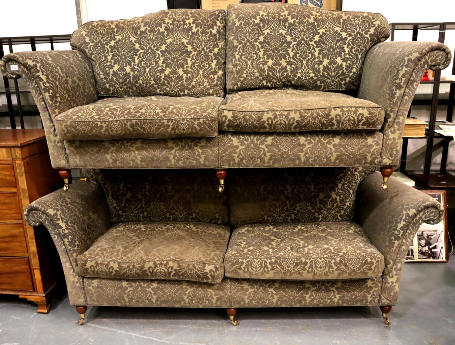 A pair of substantial contemporary sofas, upholstered in gold.brown damask. Not available for in-