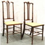 Pair of Edwardian inlaid mahogany bedroom chairs with upholstered seats. Not available for in-