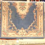 Chinese blue ground woollen rug, 140 x 220 cm. Not available for in-house P&P, contact Paul O'Hea at