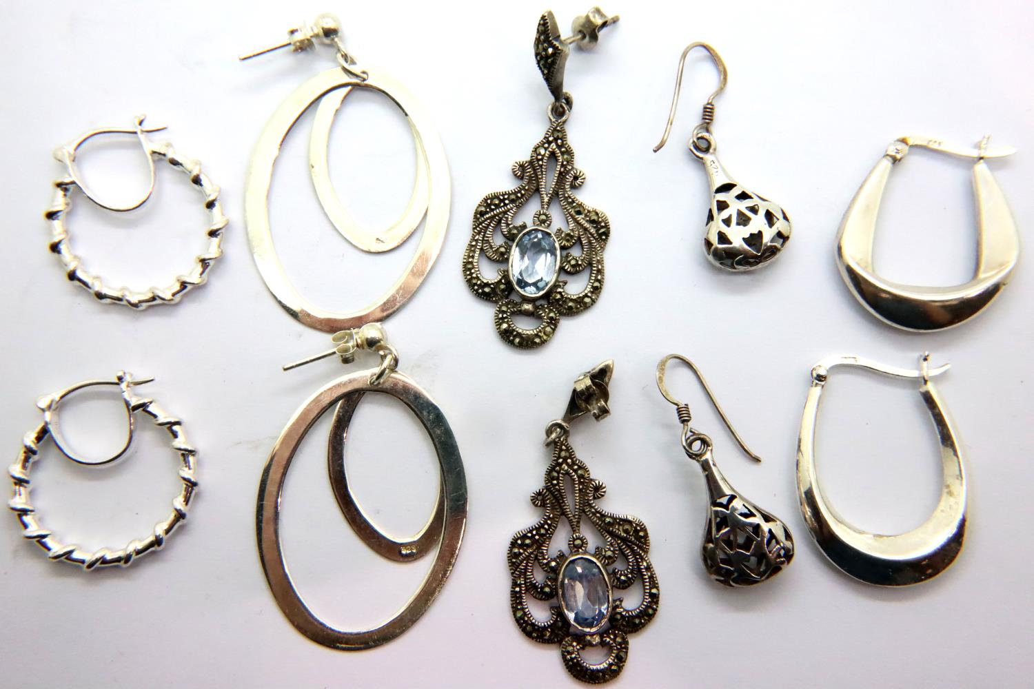 Five pairs of silver earrings including a stone set example, combined 27g. P&P Group 1 (£14+VAT