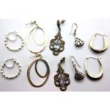 Five pairs of silver earrings including a stone set example, combined 27g. P&P Group 1 (£14+VAT
