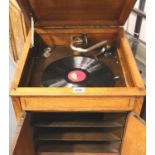 A HMV Model 156 wind-up gramophone with small quantity of 78 rpm records. Not available for in-house