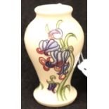 Moorcroft vase in the Bluebell Harmony pattern. P&P Group 2 (£18+VAT for the first lot and £3+VAT