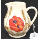 Moorcroft jug in the Harvest Poppy pattern, H: 14 cm. P&P Group 2 (£18+VAT for the first lot and £