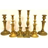 Five pairs of 19th Century brass candlesticks, largest L: 30 cm, including a pair by Walker. P&P