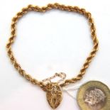 9ct gold rope bracelet with padlock clasp and safety chain, 3.4g. P&P Group 1 (£14+VAT for the first