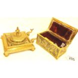 A Victorian cast brass inkstand and a relief decorated brass casket. P&P Group 2 (£18+VAT for the