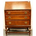 20th Century oak bureau fitted with three long drawers.74 x 41 x 101 cm. Not available for in-