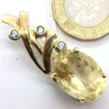 9ct gold brooch set with large faceted stone and aquamarines, 7.4g. P&P Group 1 (£14+VAT for the