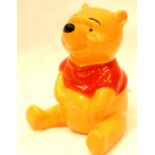Beswick Winnie The Pooh figure with gold back stamp, H: 6 cm. P&P Group 1 (£14+VAT for the first lot
