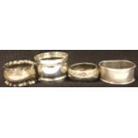 Four hallmarked silver napkin rings. P&P Group 1 (£14+VAT for the first lot and £1+VAT for