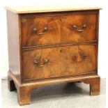 A 19th Century mahogany chest of two long deep drawers, the top drawer later converted to a rise-