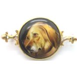 Antique gold brooch with hand painted dog panel, L: 40 mm. P&P Group 1 (£14+VAT for the first lot
