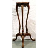 A 20th Century mahogany torchere, raised on a tri-partide support, H: 88 cm. Not available for in-