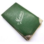 An Edwardian leather bound memo pad, having two hallmarked silver corners, Birmingham assay 1905.