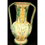 Italian faience large twin handled jug with dragon decoration, H: 40 cm (chips to base). Not
