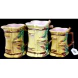 A set of three graduated jugs each decorated with bamboo. Not available for in-house P&P, contact