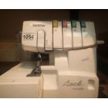 Brother overlocker sewing machine and a box with sewing contents. Not available for in-house P&P,