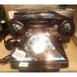 Black GPO Carrington, push button telephone in 1920s styling with pull-out pad tray; compatible with