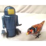 Two 1970s tinplate clockwork toys including Japanese robot 7. P&P Group 2 (£18+VAT for the first lot