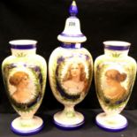 A set of three Victorian pink glass cameo vases with blue and gilt highlights each with the portrait