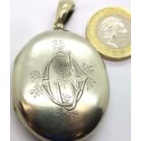Victorian hallmarked silver locket, engraved and with photograph of Sarah Ord (d.1887) wearing the