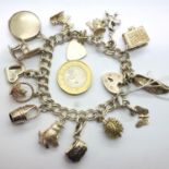 Silver charm bracelet with fourteen charms, 16cm, 57.5g, clasp fully functioning. P&P Group 1 (£14+