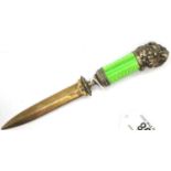 An impressive letter opener in Russian silver, having an enamelled grip, owl head pommel with rose