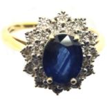 18ct yellow gold diamond and sapphire ring. 48g. Size P. P&P Group 1 (£14+VAT for the first lot