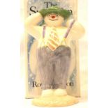 Royal Doulton Stylish Snowman, H: 12 cm. P&P Group 1 (£14+VAT for the first lot and £1+VAT for