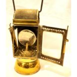 Antique brass lamp with reflector, lacking one side panel. P&P Group 3 (£25+VAT for the first lot