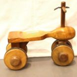 Child teak four wheel push along bike. Not available for in-house P&P, contact Paul O'Hea at